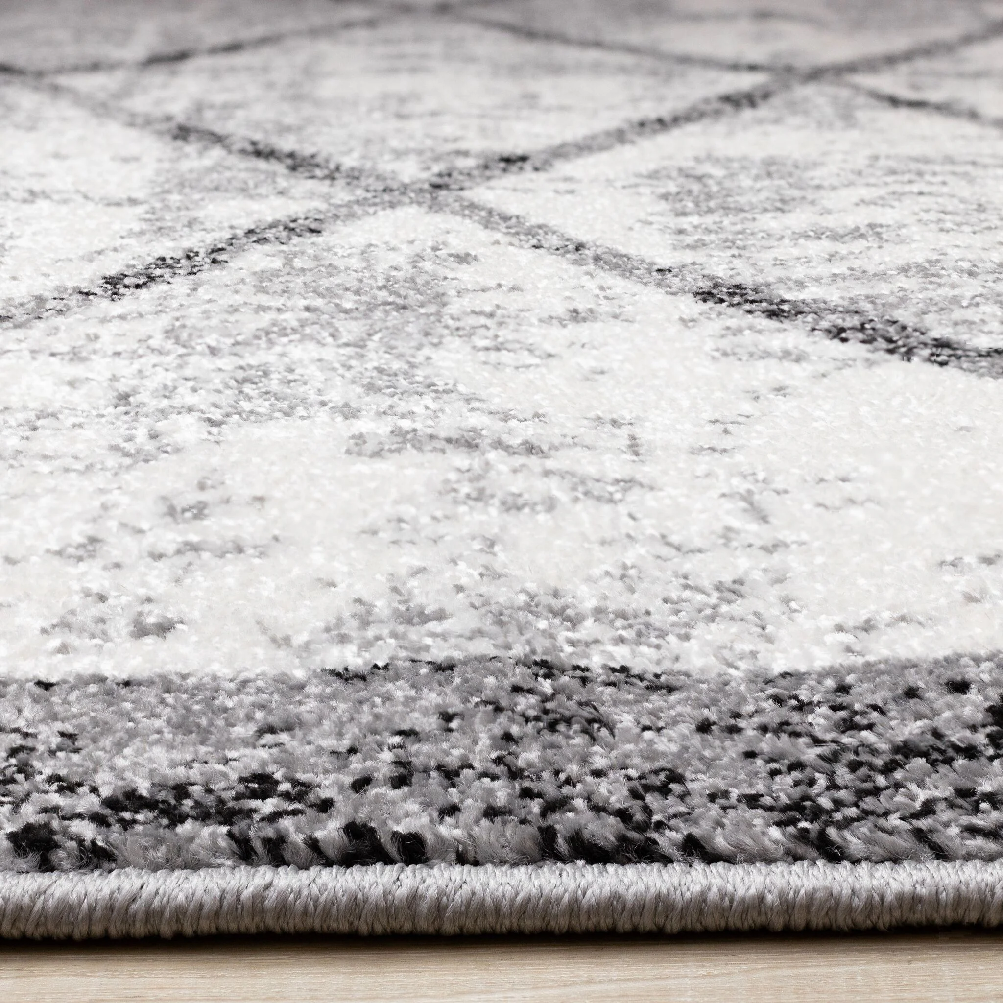Ashwood 5'3" x 7'7" Distressed Lattice Area Rug - Grey, Black, White - Image 5
