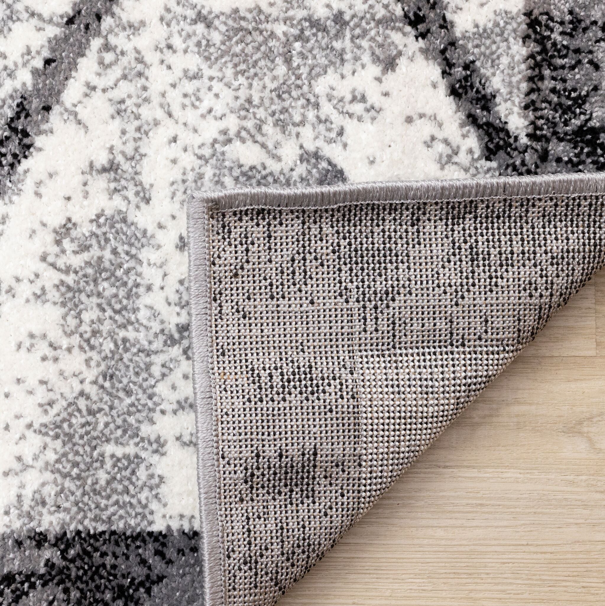 Ashwood 5'3" x 7'7" Distressed Lattice Area Rug - Grey, Black, White - Image 7