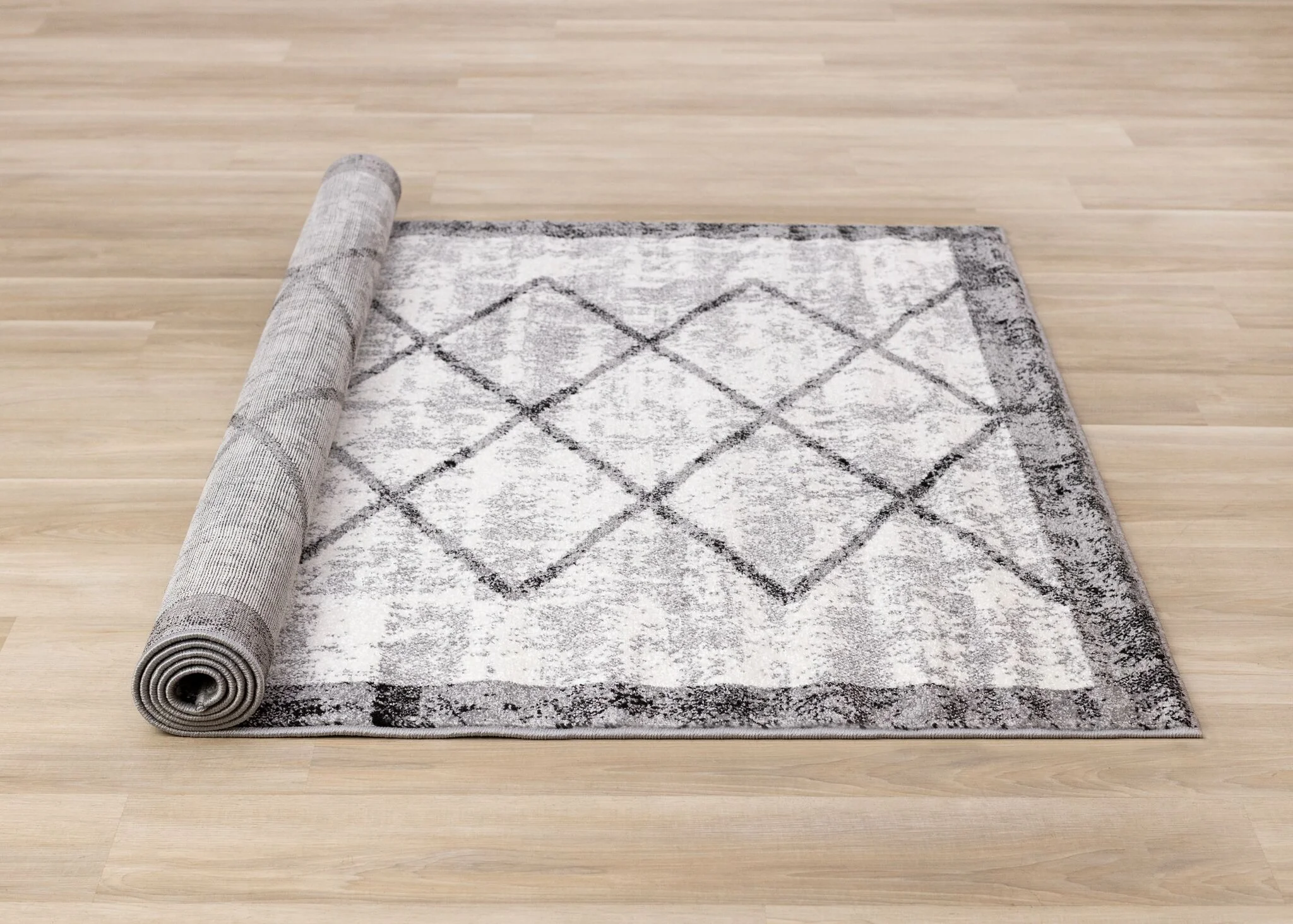 Ashwood 5'3" x 7'7" Distressed Lattice Area Rug - Grey, Black, White - Image 9