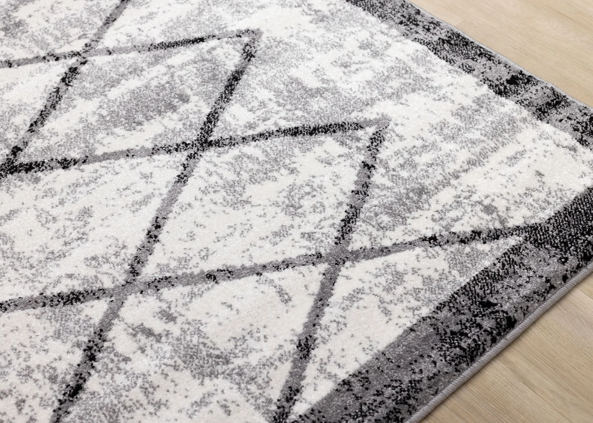 Ashwood 6'7" x 9'10" Distressed Lattice Area Rug - Grey, Black, White - Image 5