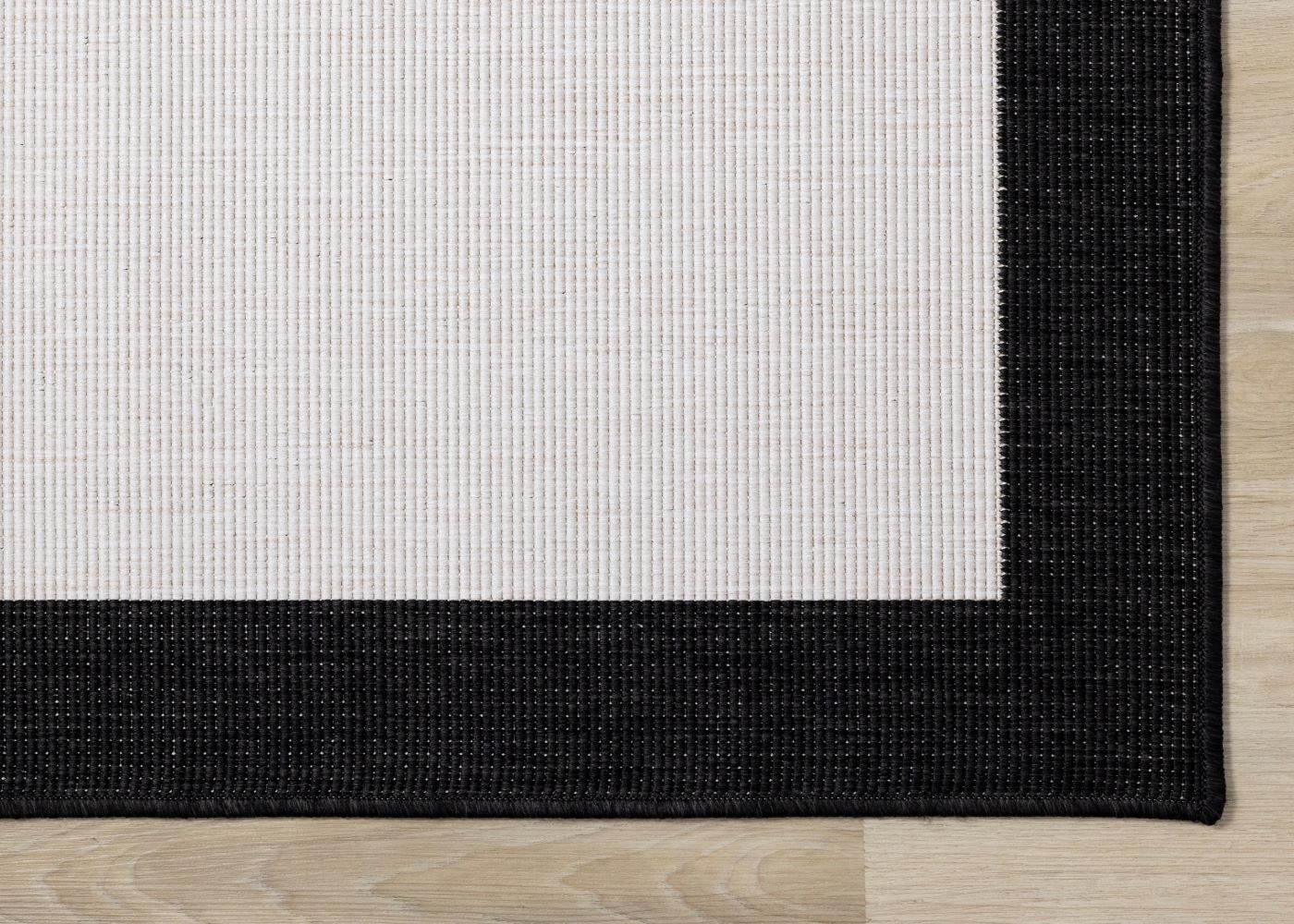 Summer Breeze 6'7" x 9'6" Reversible Outdoor Rug - Cream, Black Border - Image 6